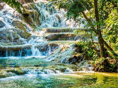 Dunn's River Falls in Jamaica. This gorgeous setting is something perfect to explore during your destination wedding trip or honeymoom.
